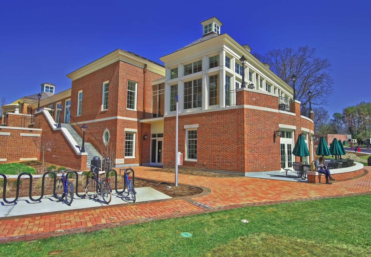 Blum Construction sustainable construction project exterior of building with bike racks and outdoor seating