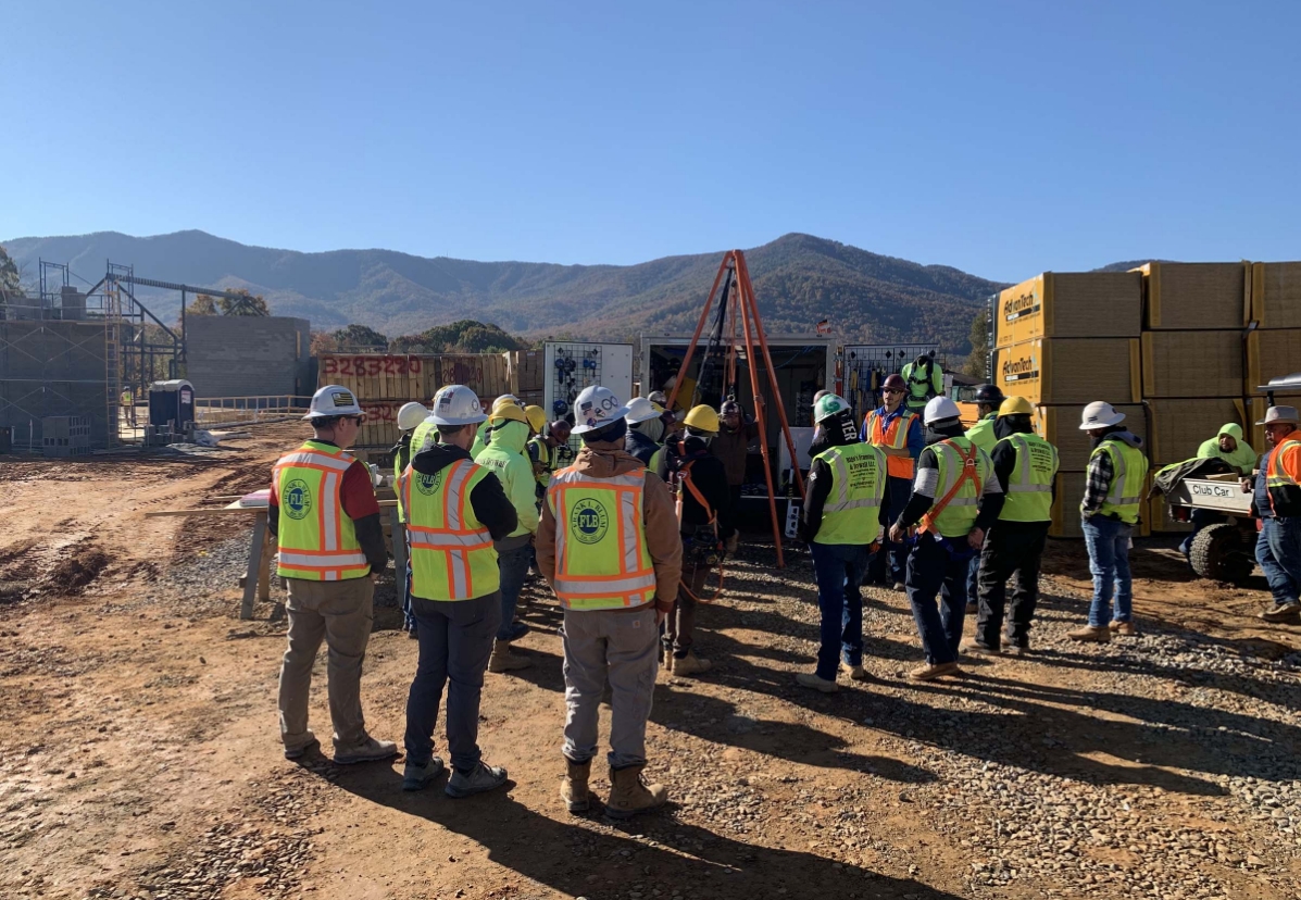 Blum Construction workers in safety gear at work site